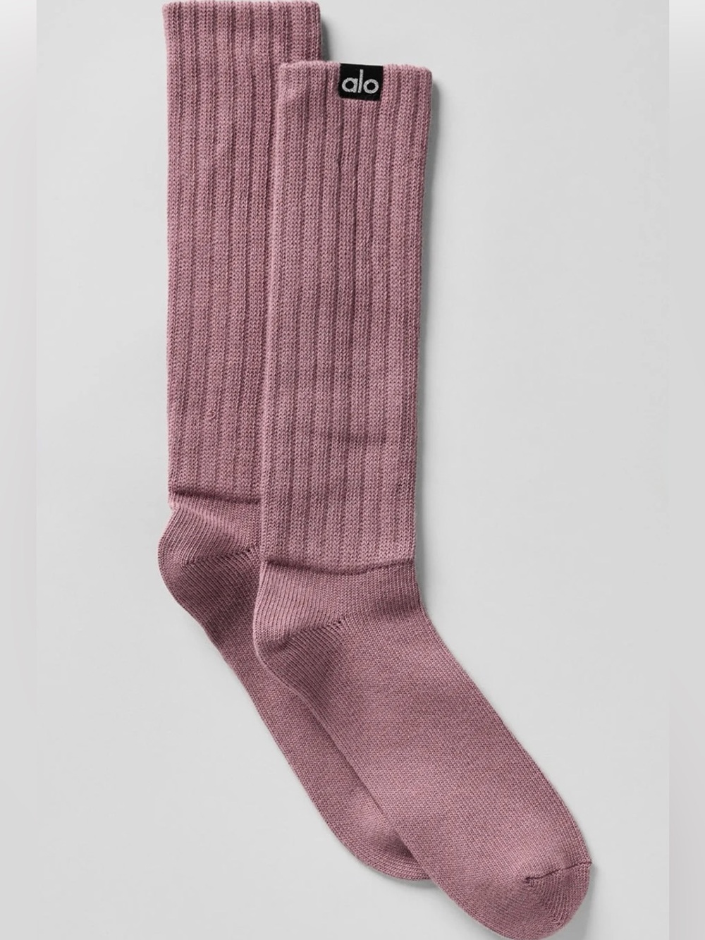 Alo Yoga Unisex Scrunch Socks in a ribbed, mauve-colored knit.